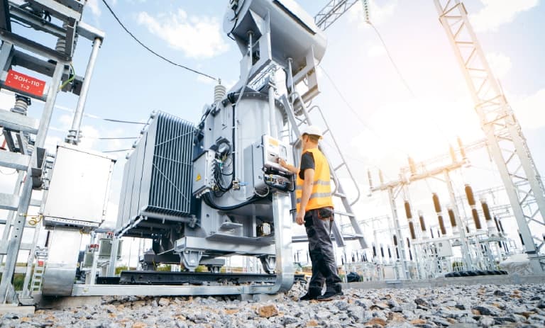 Field worker monitoring transformer health and performance