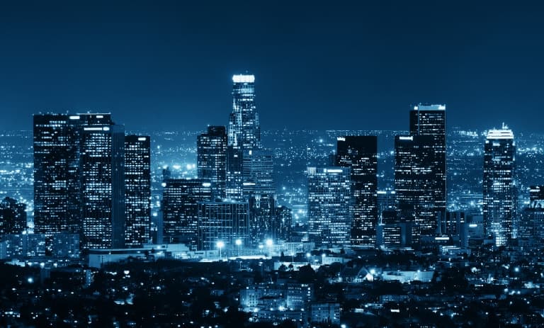cityscape at night with blue tint