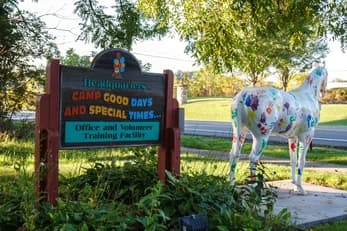 Cow sculpture artistically decorated at a community event